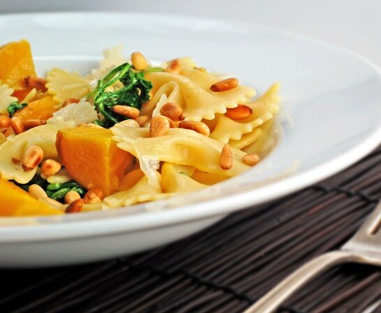 Farfalle with Golden Beets, Beet Greens and Pinenuts