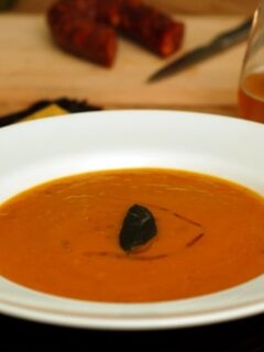 A bowl of roasted Kabocha soup and a glass of beer make for a perfect meal.