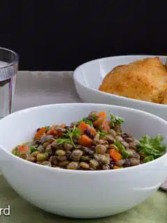 A bowl of lentils and water for Grandma's homemade lentil soup.