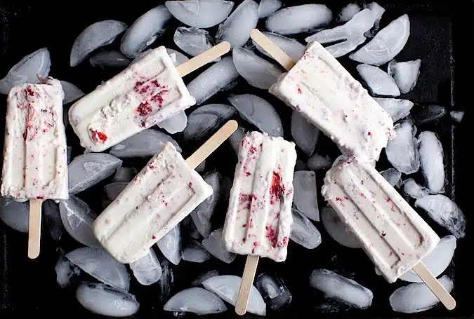 Vanilla Ice Cream Popsicles with Roasted Strawberry Swirls
