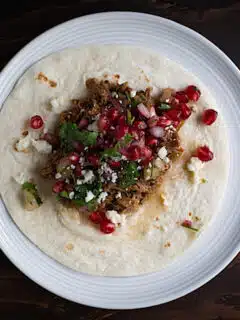 Slow Cooker Harissa Lamb Tacos with Pomegranate Salsa